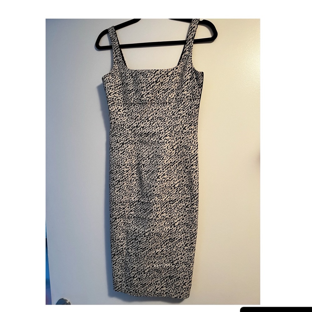 Gently used Diane Von Furstenberg sheath dress with low back. X-small